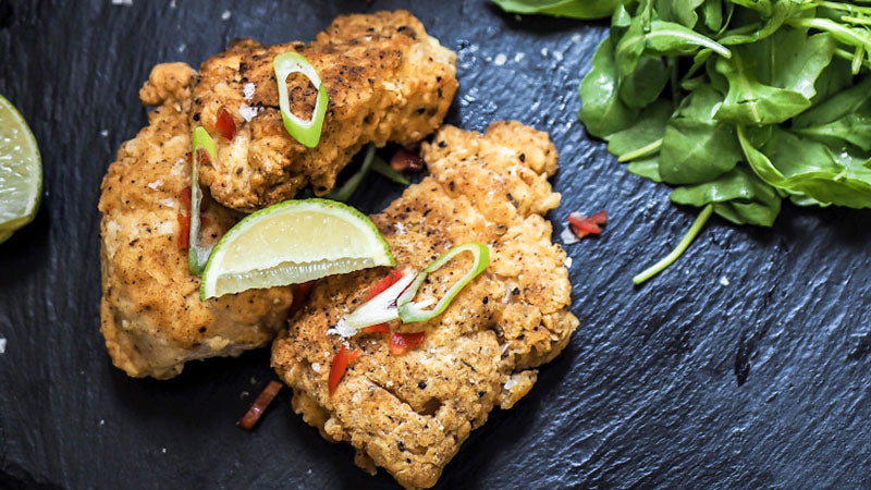 In case you’re stuck in a recipe rut this month, here’s a really easy healthy fried chicken recipe to try from Nick Mitchell’s new cookbook, The Ultimate Performance Cookbook