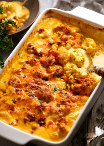 Cauliflower Cheese is a British dish that is served as a side or even as a main (vegetarian!) It’s a cauliflower bake, smothered in a creamy cheese sauce that’s popped in the oven until bubbly and golden