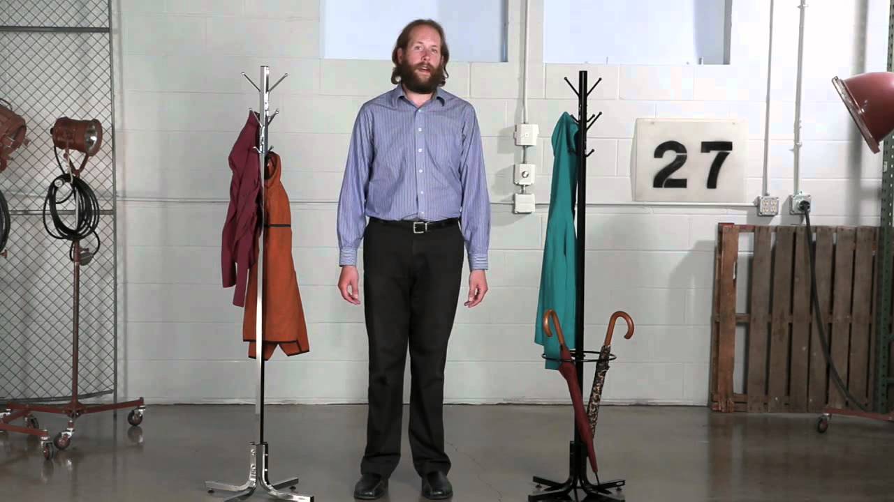 Design features four double hooks that securely hold up to eight garments plus an umbrella stand with drip pan