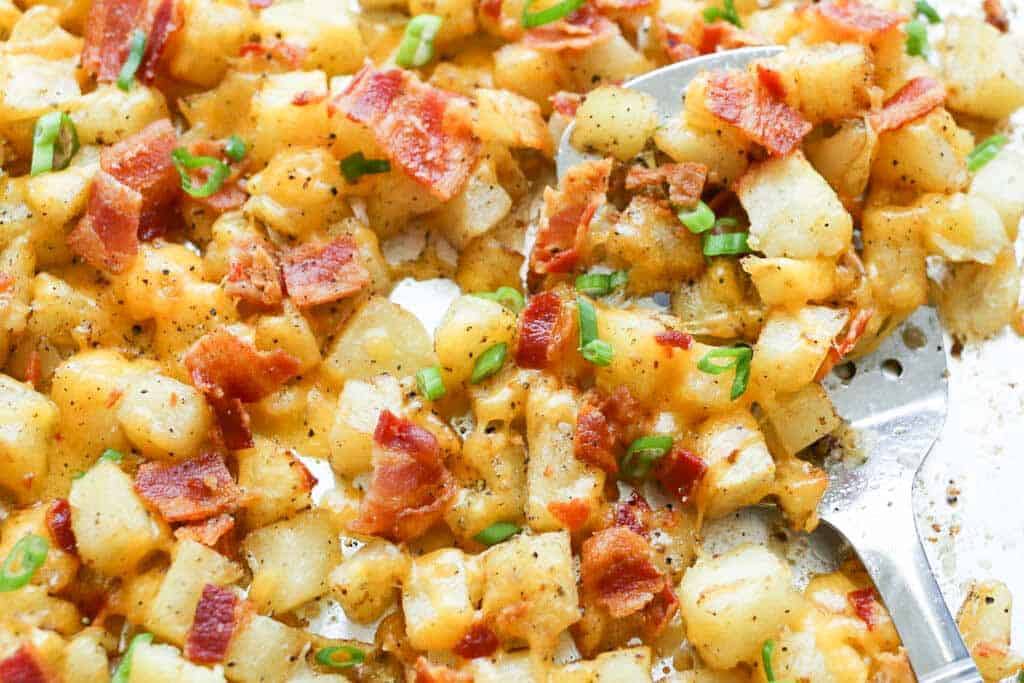 Crispy roasted potatoes, topped with melting cheese and plenty of crisp bacon are a great side dish (or main dish!) for any meal