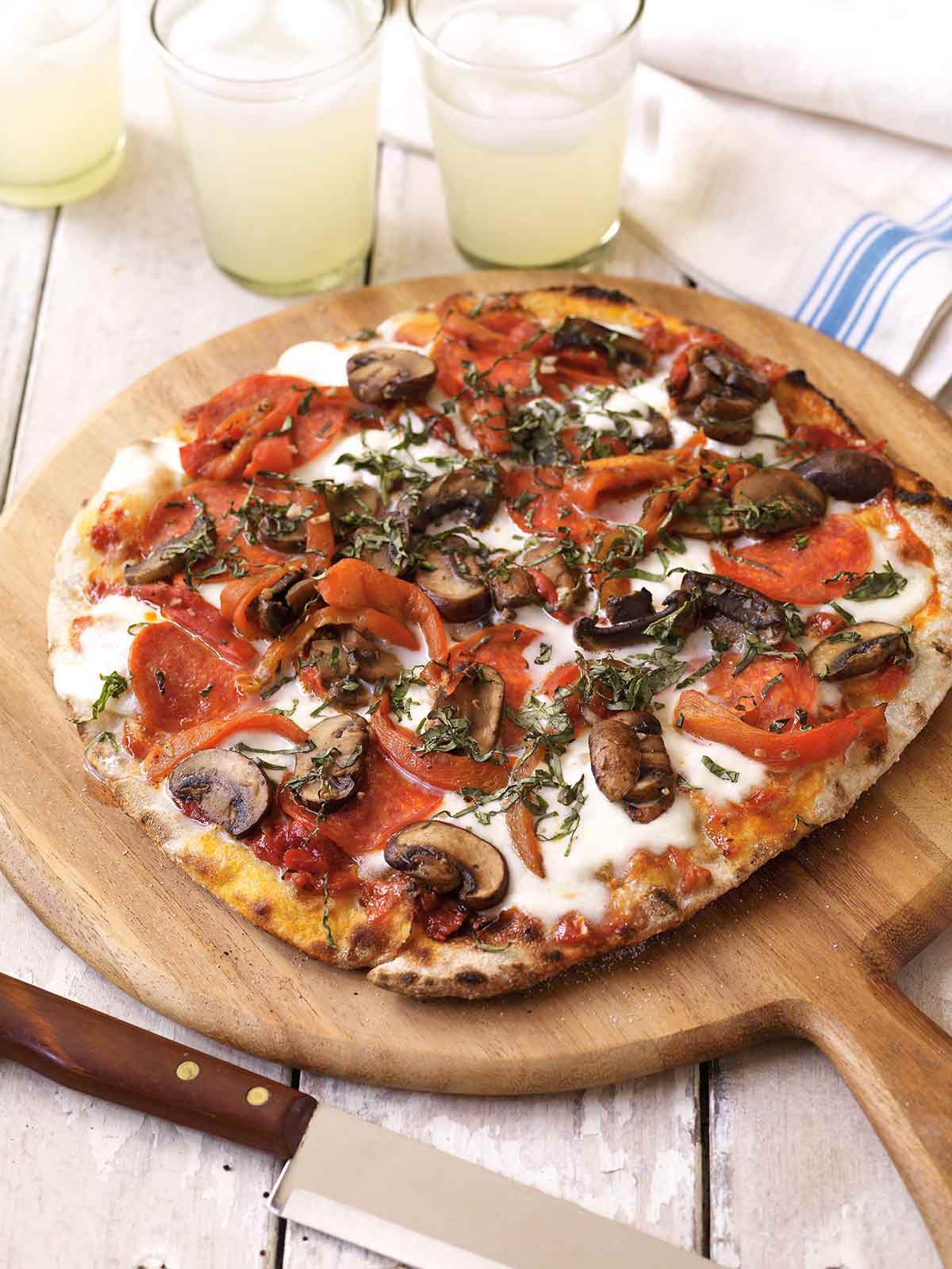 Grilled pizza with mushrooms and pepperoni is a terrific outdoor dinner