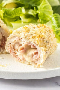 Chicken Cordon Bleu has layers of ham and cheese wrapped inside succulent crumbed chicken breast and with a crunchy breadcrumb crust