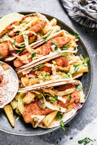 Never have a soggy fish taco again! Our Air Fryer Fish Tacos produce the CRISPIEST breaded fish without all the fat and calories and WITH all the flavor