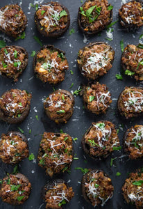 An easy and elegant recipe for Smoked Sausage Stuffed Mushrooms cooked on your smoker (or oven)